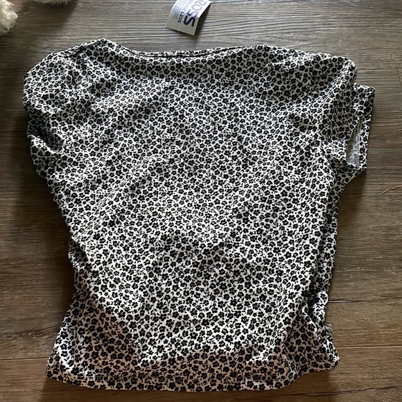 Cute soft shirt with cross in the frount. New with tags - Picture 2 of 3